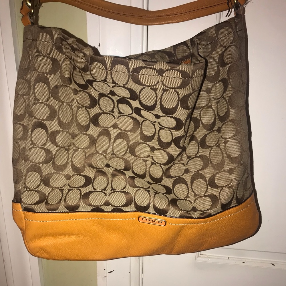 Brown with Orange accent authentic Coach bag